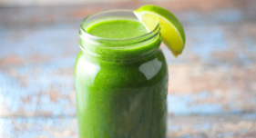 A close up of a green fruit smoothie.